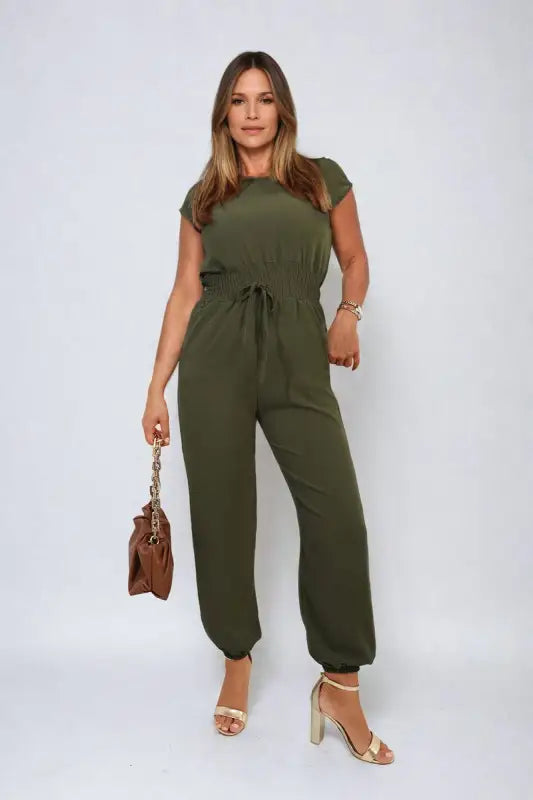 Lady wearing green Jumpsuit